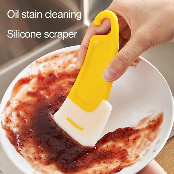 These pan cleaOil Stain Cleaning Silicone Scrapper