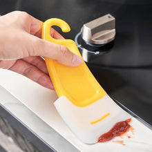 These pan cleaOil Stain Cleaning Silicone Scrapper